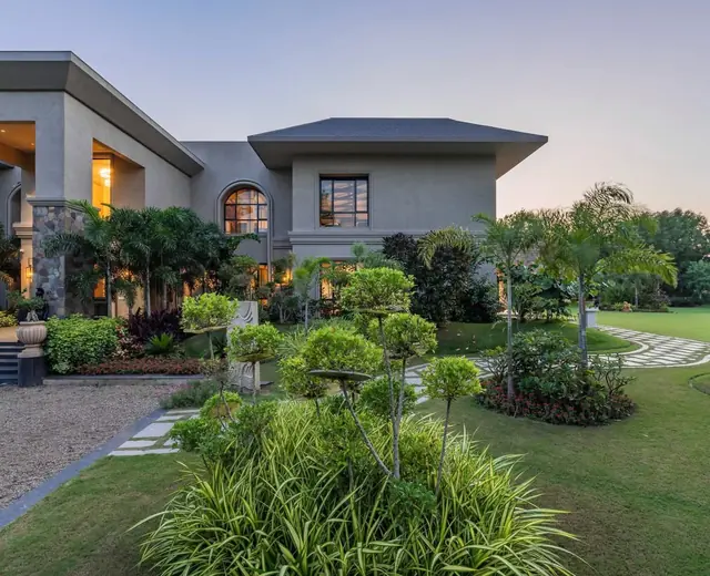 Landscaped lawn surrounding a modern residence